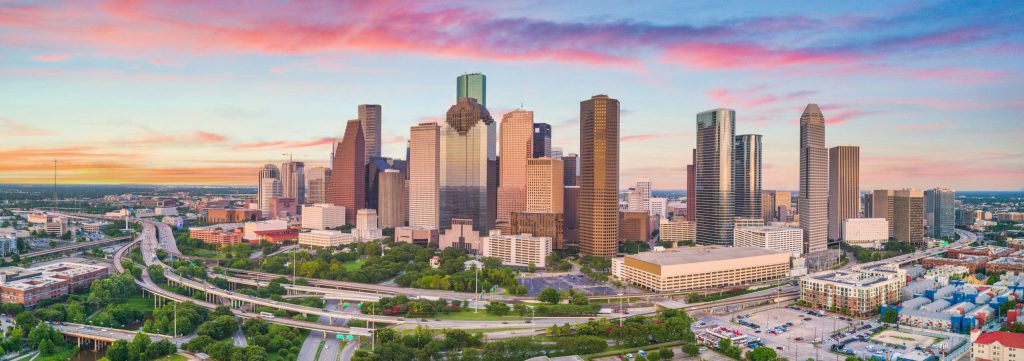Houston’s downtown buildings can be seen during a beautiful sunset.