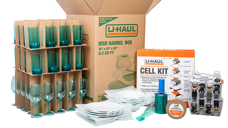 A U-Haul dish packing kit is displayed alongside other packing materials.