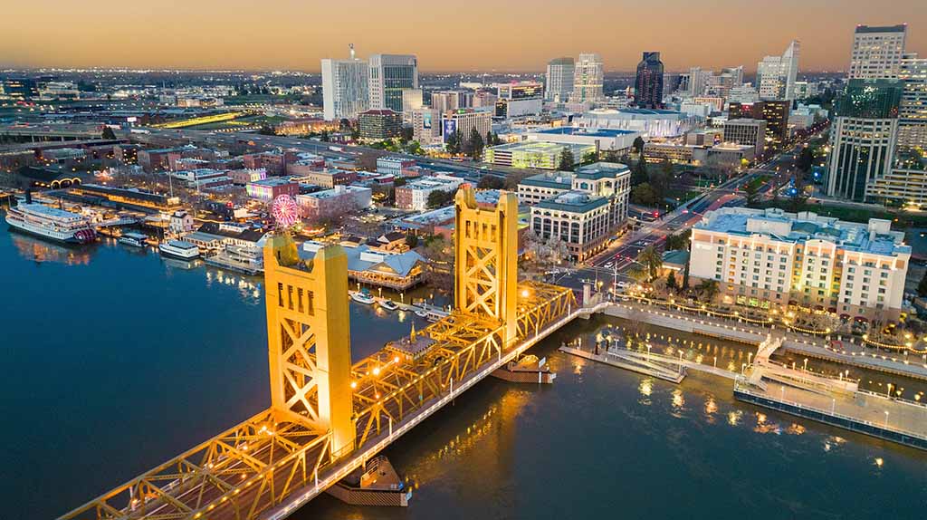 The Sacramento River, the Tower Bridge, and part of downtown Sacramento can be seen in this aerial shot.