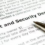 A pen rests on a printed document labeled “Rent and Security Deposit.” The document showcases the concept of a security deposit, which can be either refundable or non-refundable.