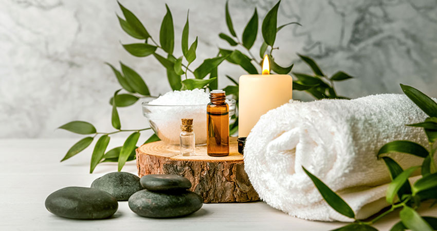 Relaxation items used for a spa treatment sit together.