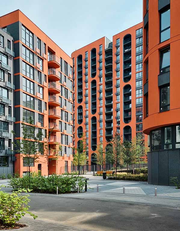 High-rise apartments can be seen in an aerial shot on a mostly cloudy day. Moving into a high-rise apartment doesn’t have to be difficult.