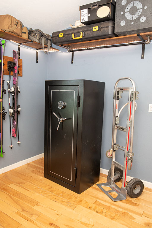 A gun safe sits next to a utility dolly in the customer’s mudroom. What will movers not move? A mover might not move an 800+ pound gun safe for customers when they must deal with stairs.