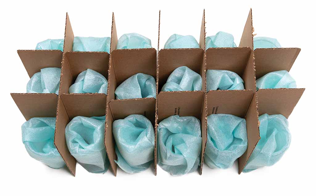 An overview photo shows a cell kit with glass cups packed with a cushion pouch surrounding them.