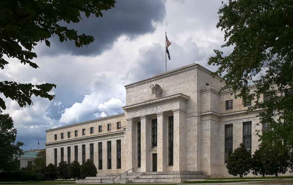 The U.S. Federal Reserve building is seen on a mostly cloudy day in Washington D.C.