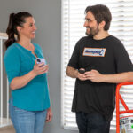 A customer shows the Moving Help Service Provider the Payment Code that’s on her phone after the Service Provider completed her move. After the job is completed, customers can still find their Moving Help receipt in their Customer Account.